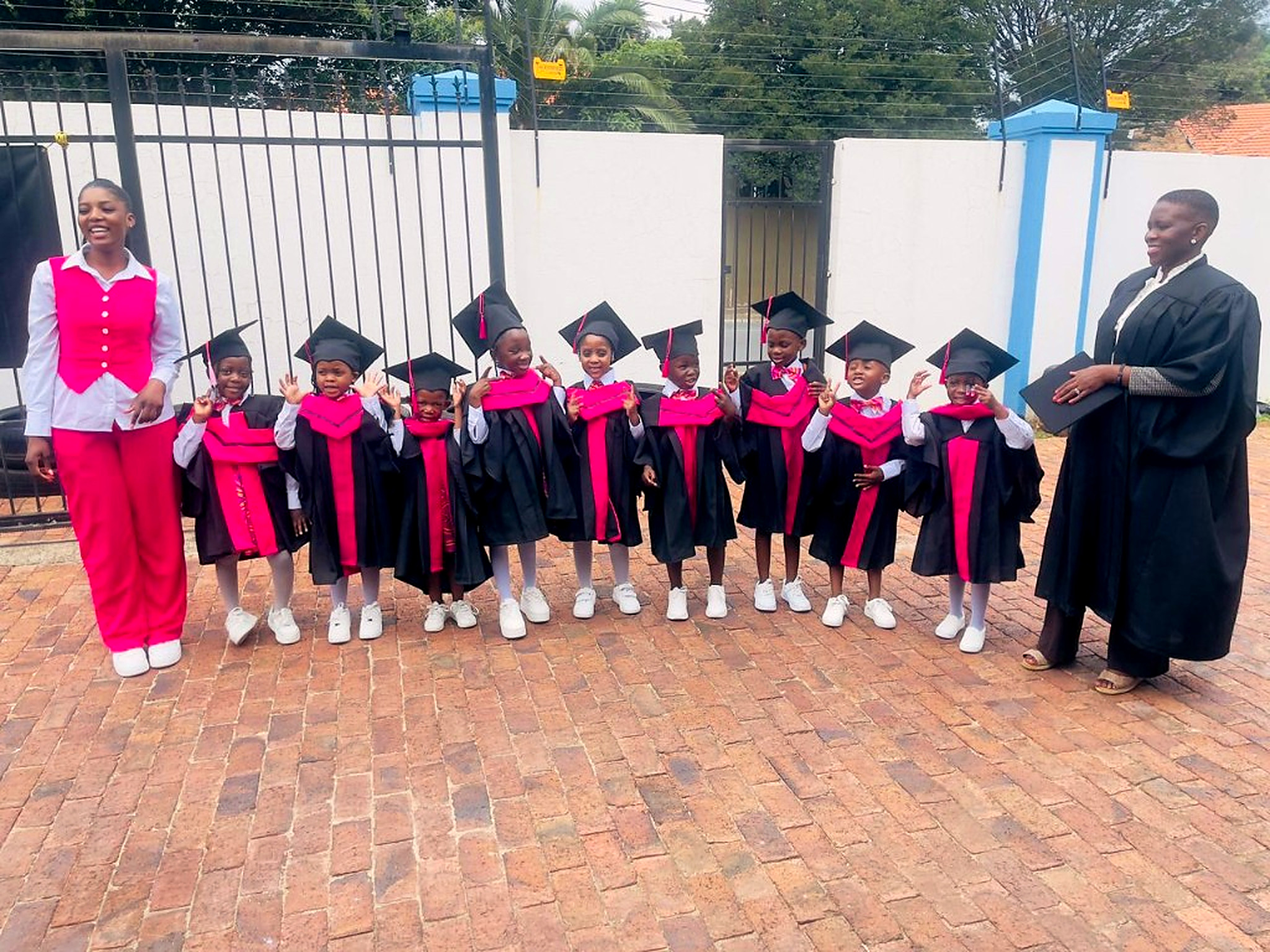 Graduates lined up outside Smart Start Academy