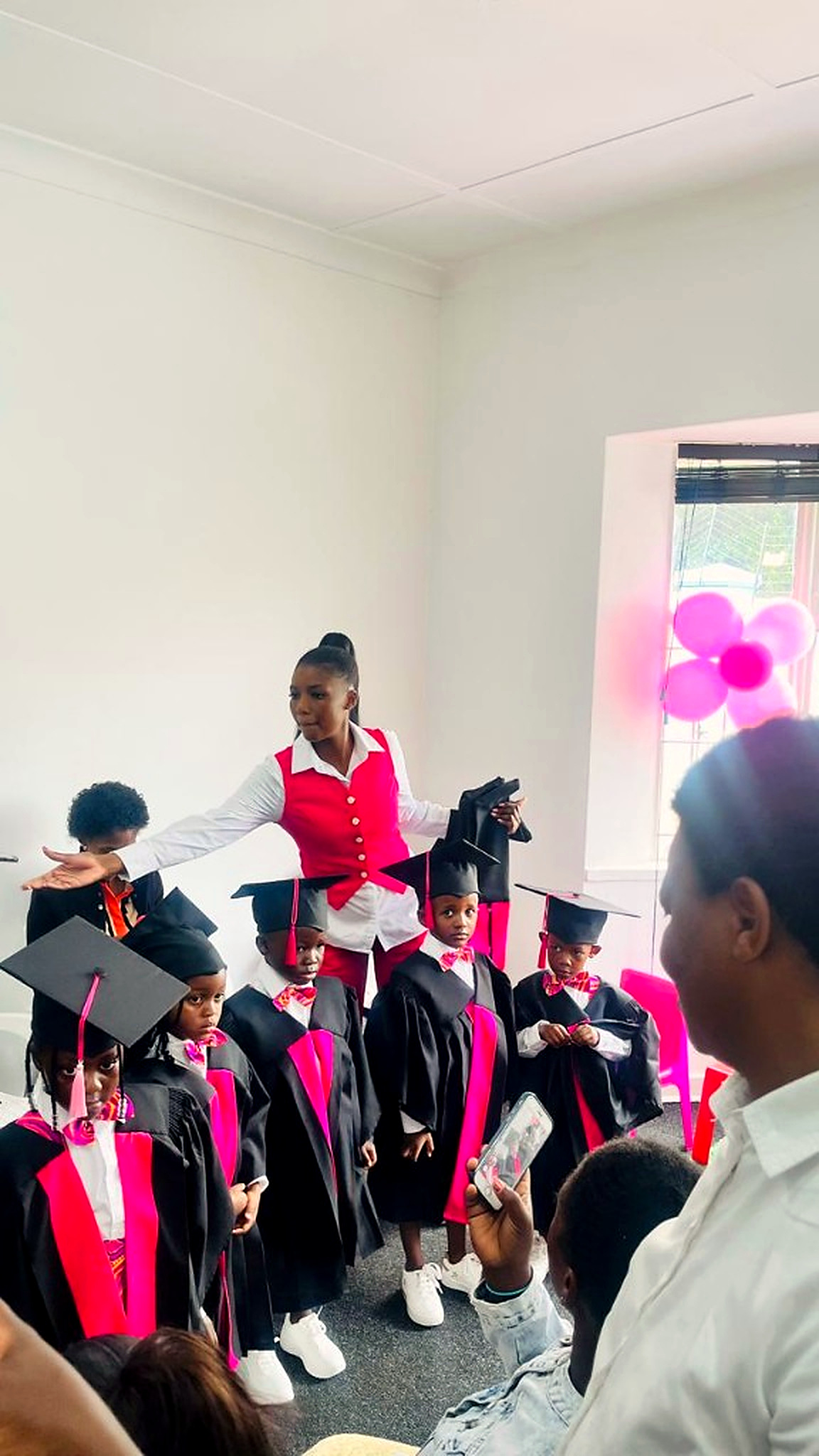 An educator preparing the graduates