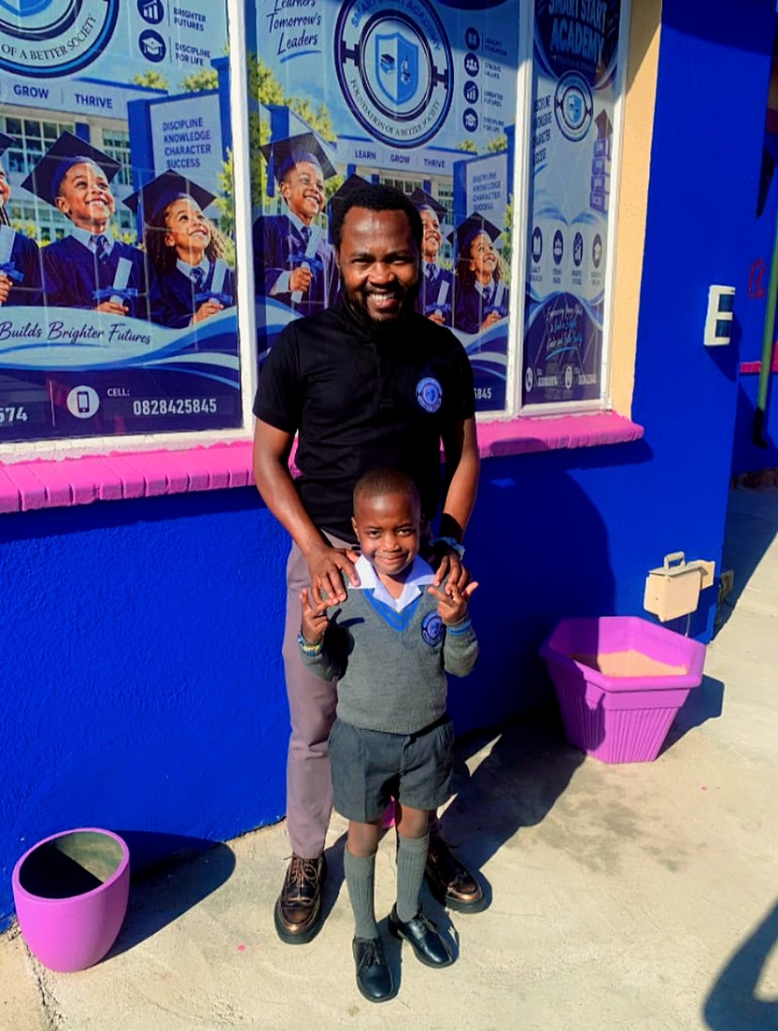 Mr M Njaph, School Director and Principal, with a Smart Start learner
